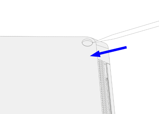 A spudger is pressed into the middle of the foot.